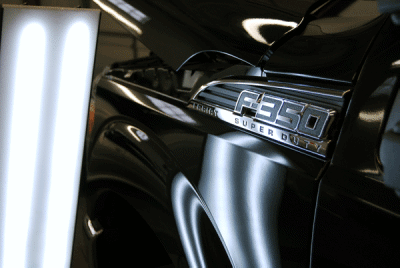 Ford F350 Super Duty door dent repaired at Dent Werks PDR in MN