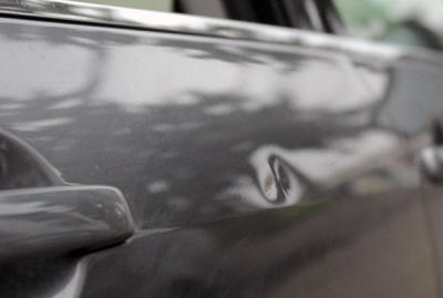 Using PDR to repair boady line door ding